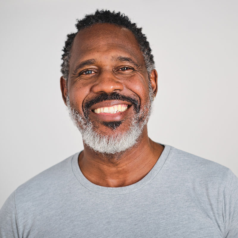 Handsome hispanic Latino carefree black male smiling